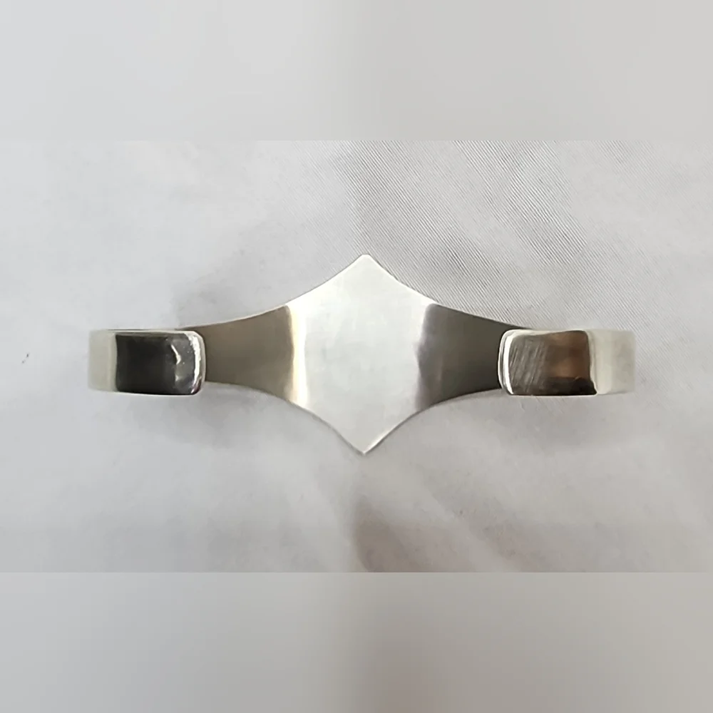 Vintage Sterling Silver Taxco Cuff Bracelet with turquoise inlay.